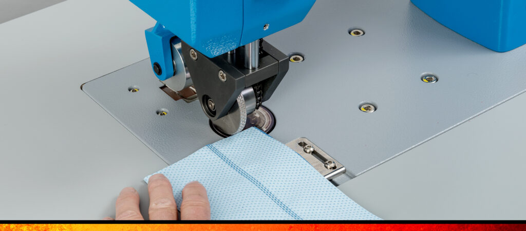 Ultrasonic bonding process shown on medical mask.